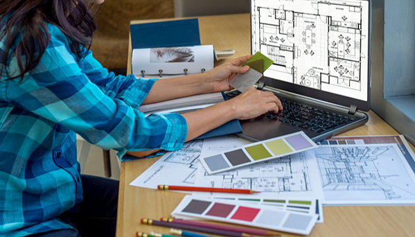 A girl creating interior Designing on PC